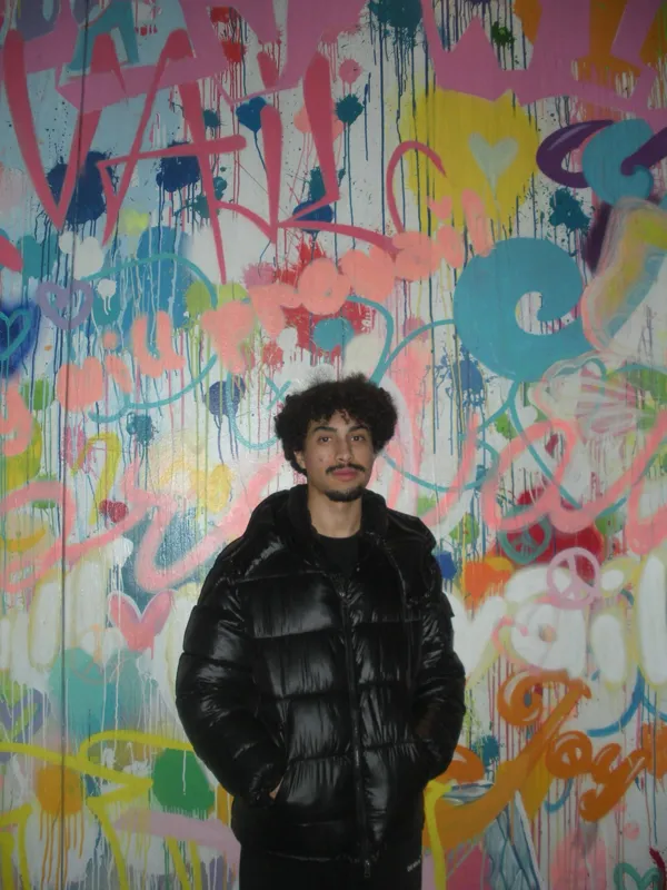 Portrait facing the camera at the mural